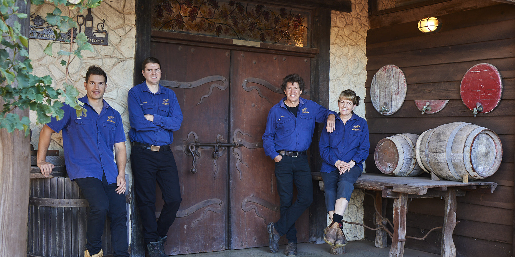 Garbin family standing in front of the cellar door.